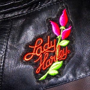 Women's size small leather vest with Lady Harley.